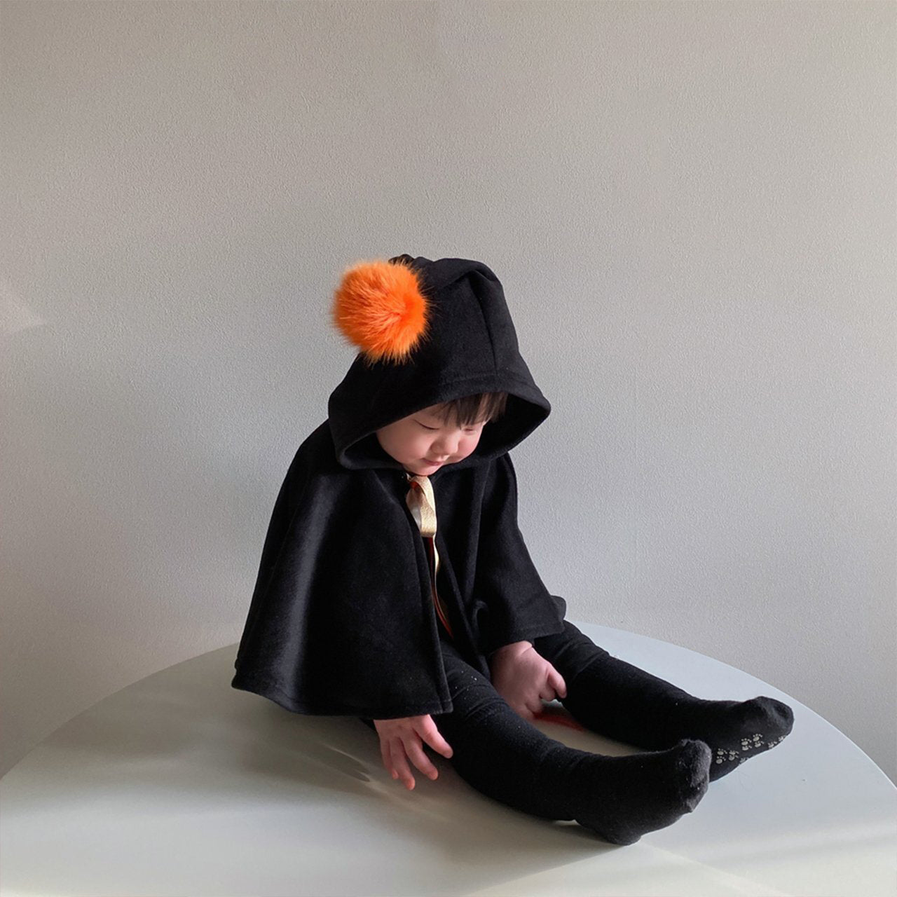 Kids Orange Pompom Cone Cape (0-8y) - Black - AT NOON STORE