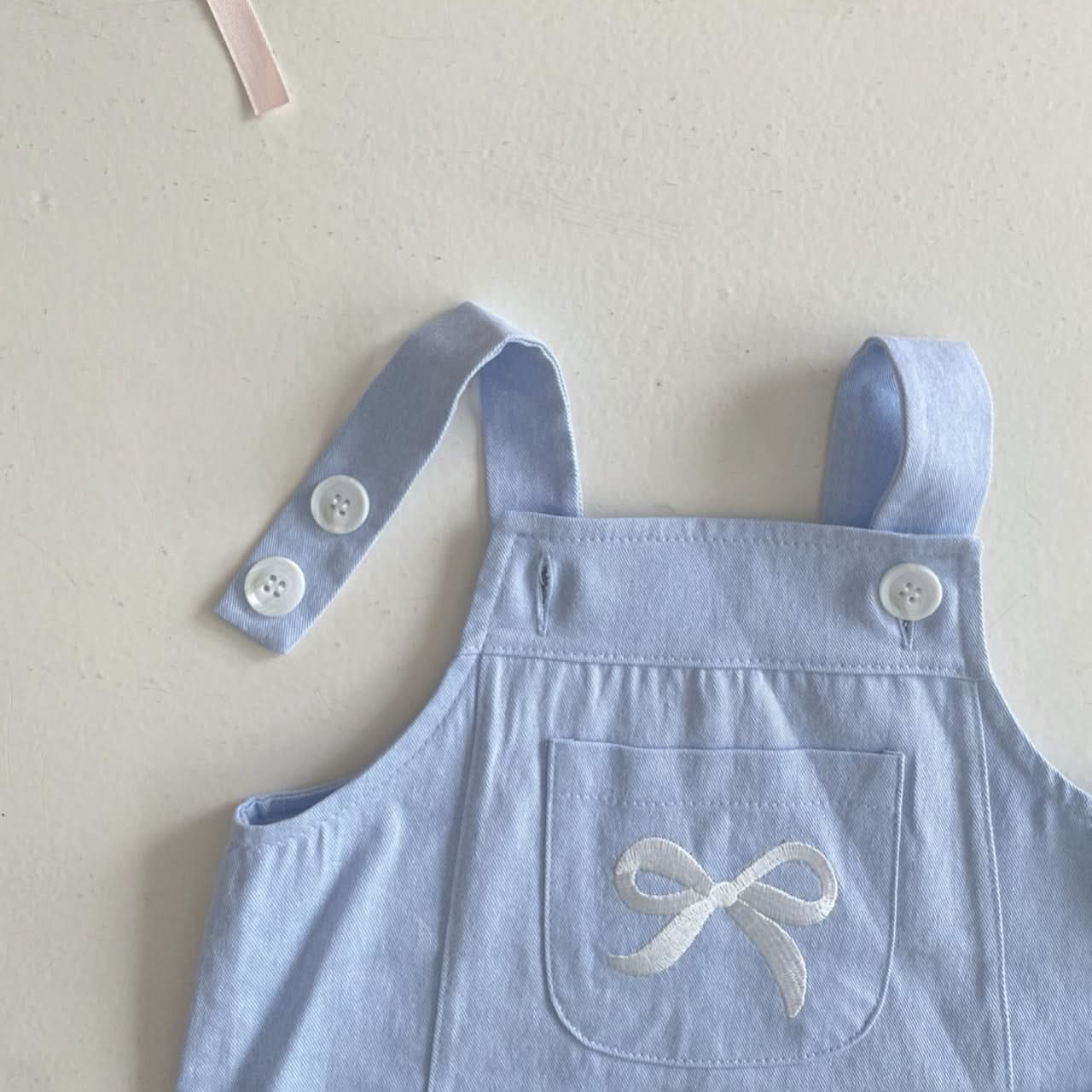 Girls Bow Kangaroo Pocket Skirtall (6 - 24m) kids outfit