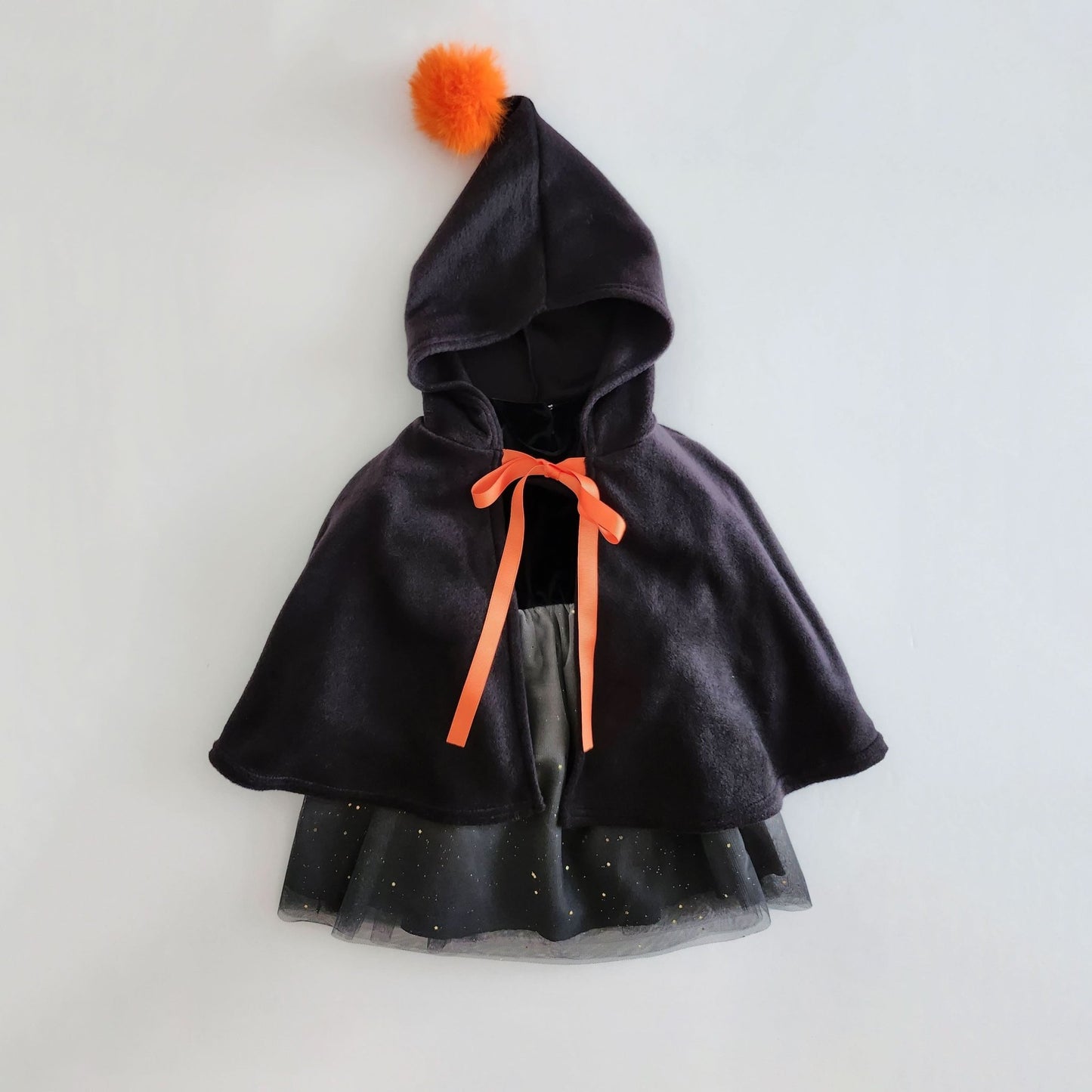 Kids Orange Pompom Cone Cape (0 - 8y) - Black kids outfit