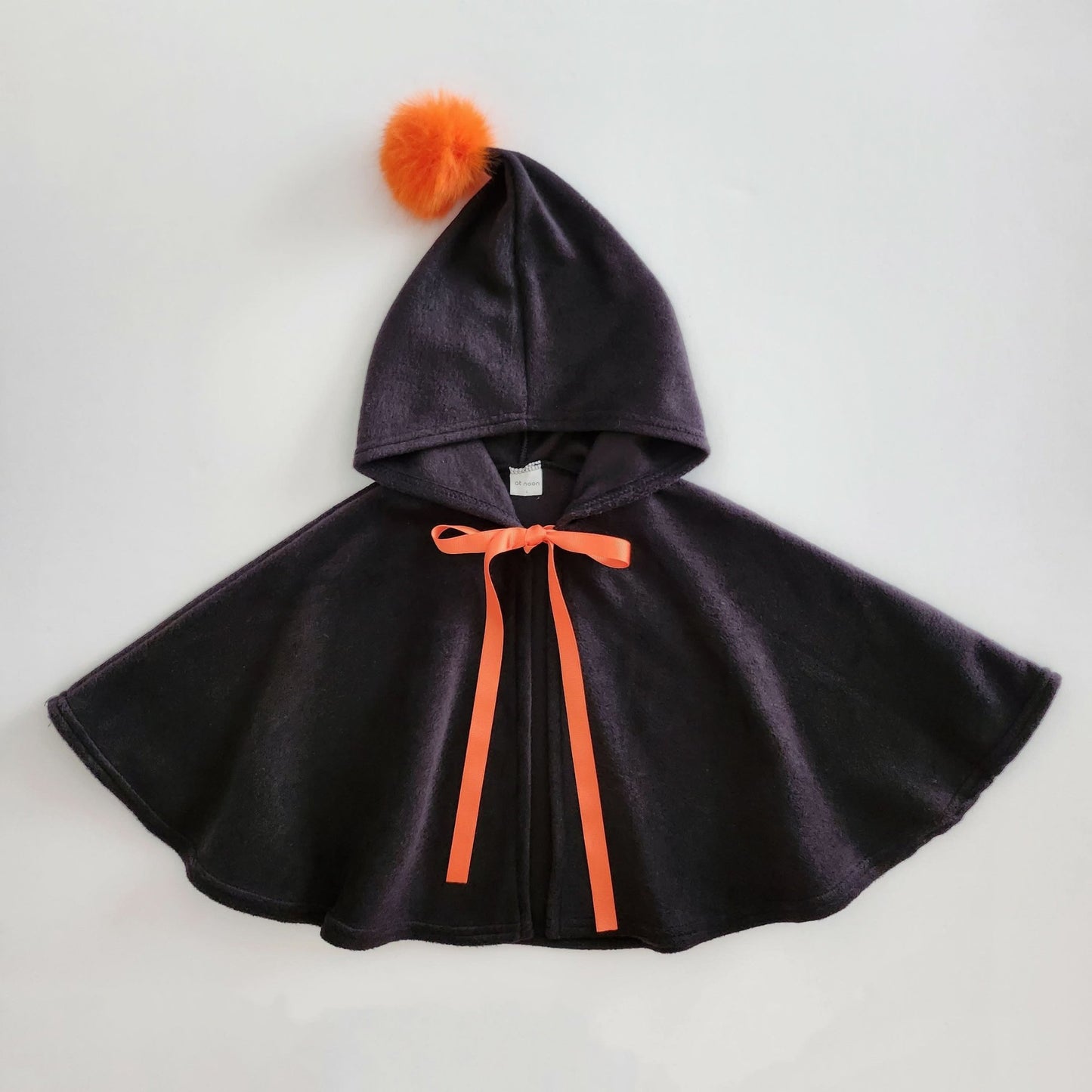 Kids Orange Pompom Cone Cape (0 - 8y) - Black kids outfit