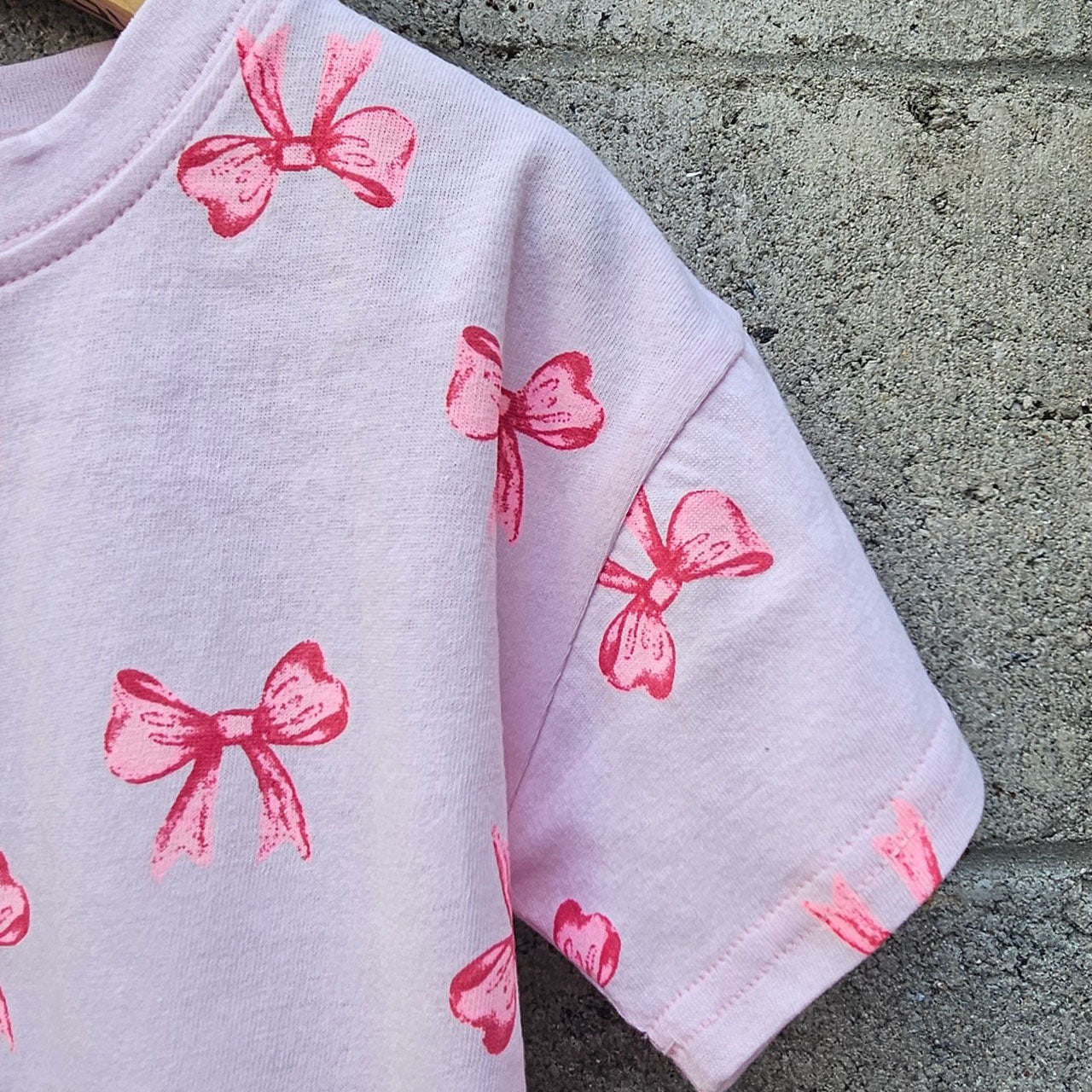 Kids SS25 Bow Print Short Sleeve Top (2 - 7y) - 2 Colors kids outfit