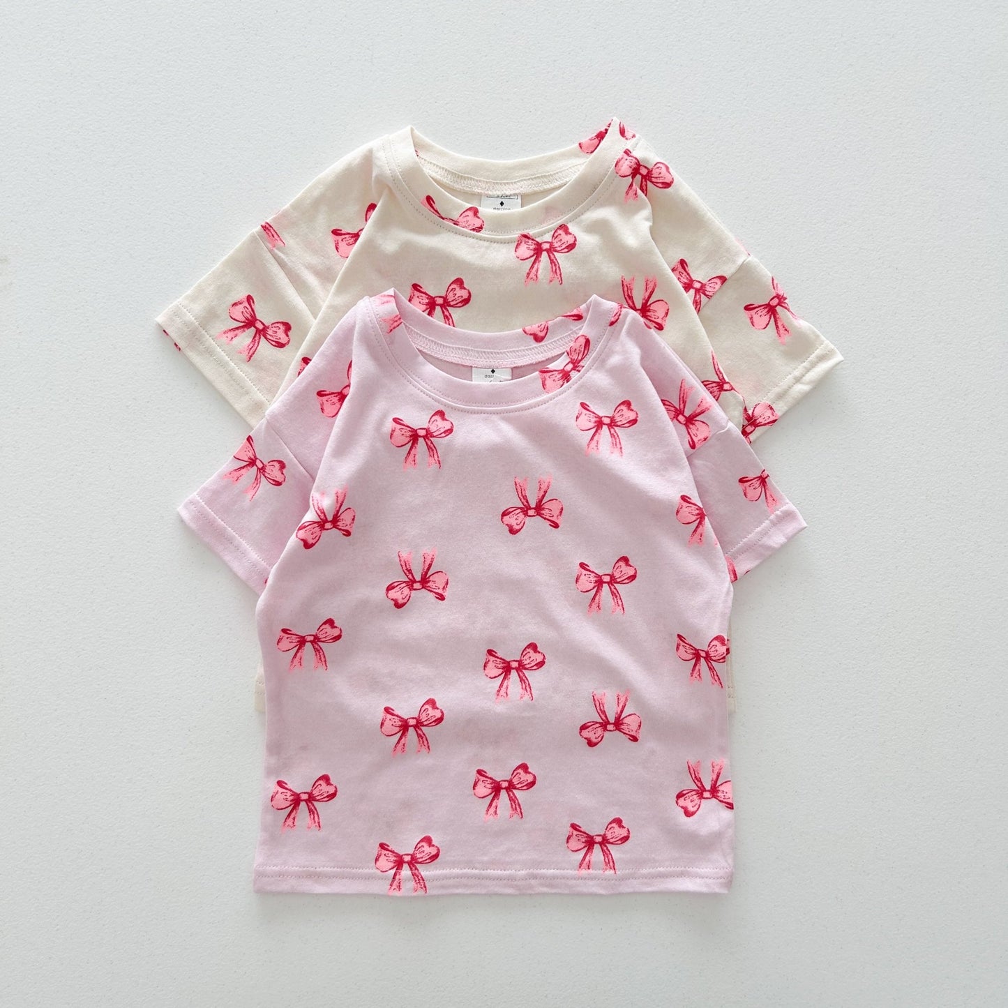 Kids SS25 Bow Print Short Sleeve Top (2 - 7y) - 2 Colors kids outfit