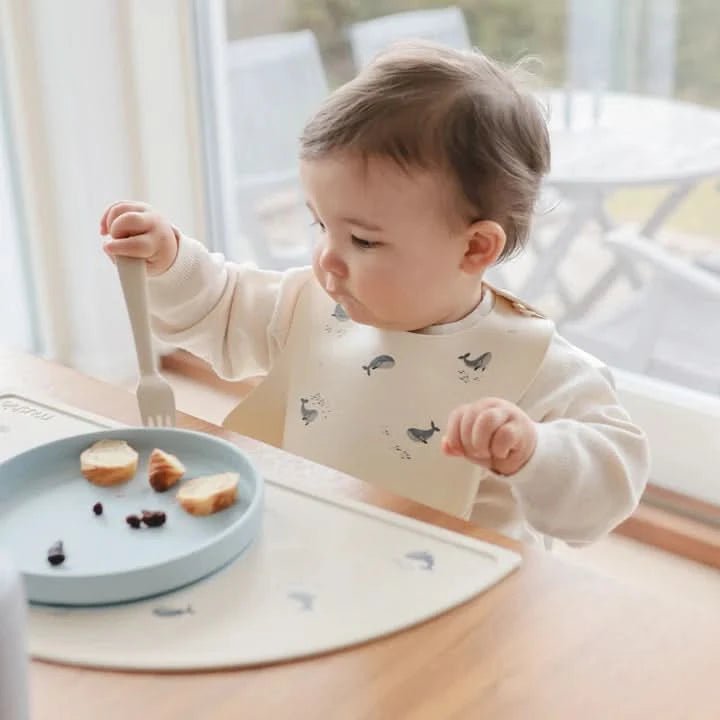 Mushie Silicone Baby Bib - Whales kids outfit