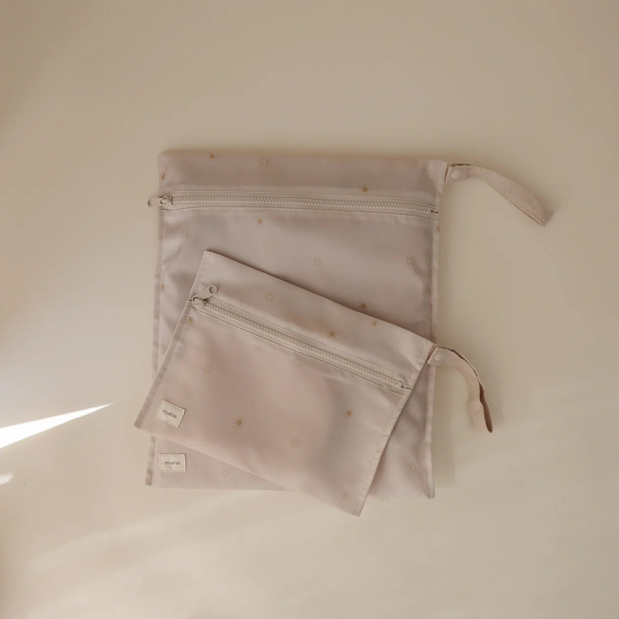 Mushie Water Resistant Wet Bag - Sun kids outfit