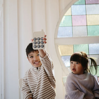 Mushie Phone Press Toy (Cambridge Blue) kids outfit