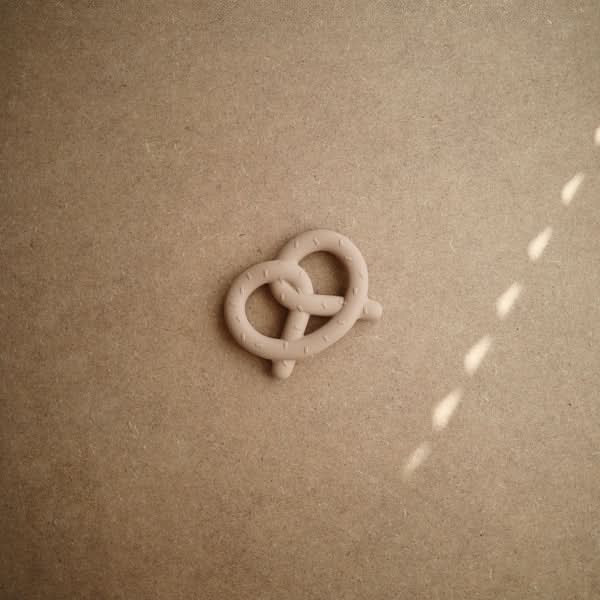 Mushie Pretzel Teether (Natural) kids outfit